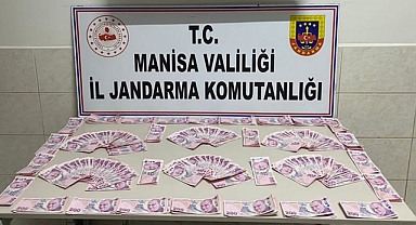 Akhisar'da piyasaya sahte paran süren iki kişi tutuklandı